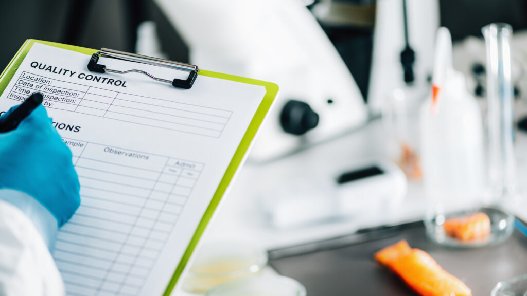 Clipboard for taking notes on food safety in a lab